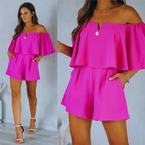 NWT Pocketed off the should romper from Vici in magenta.